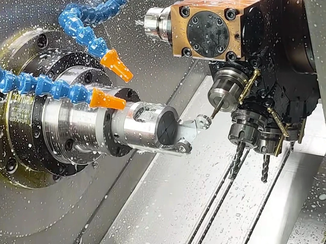 Mill-turn tooling machining a metal component held in a chuck