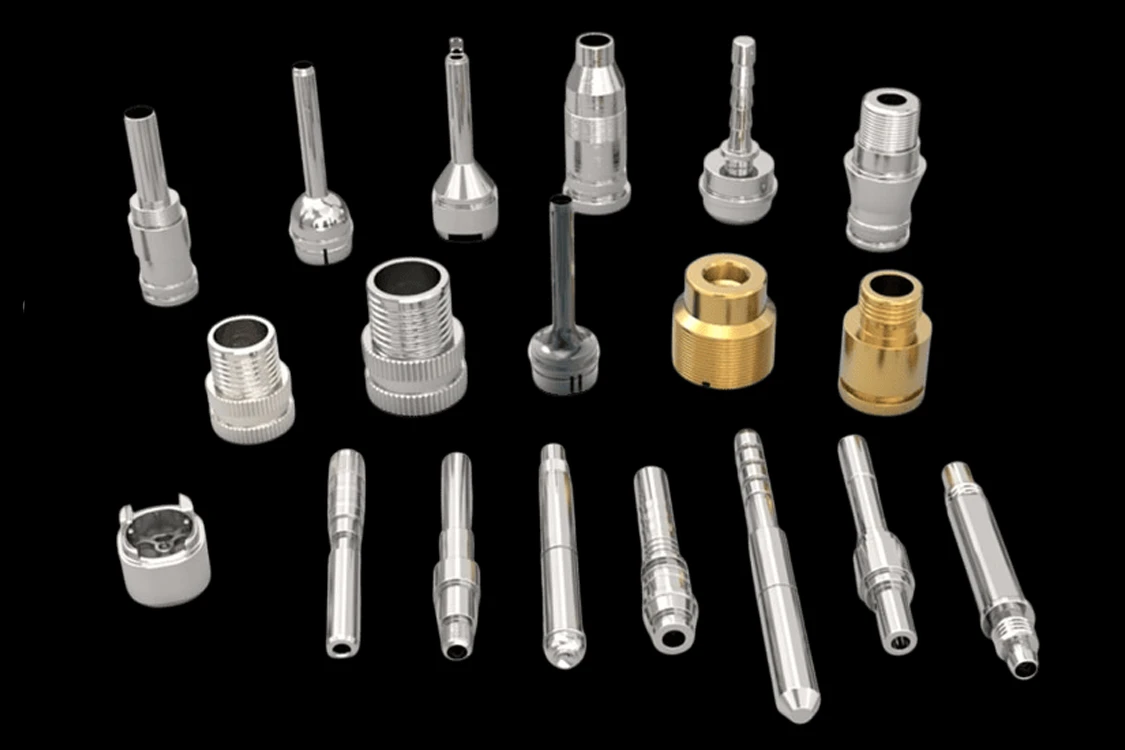 Assorted turned metal components with hollow bores, threaded bodies and stepped shafts